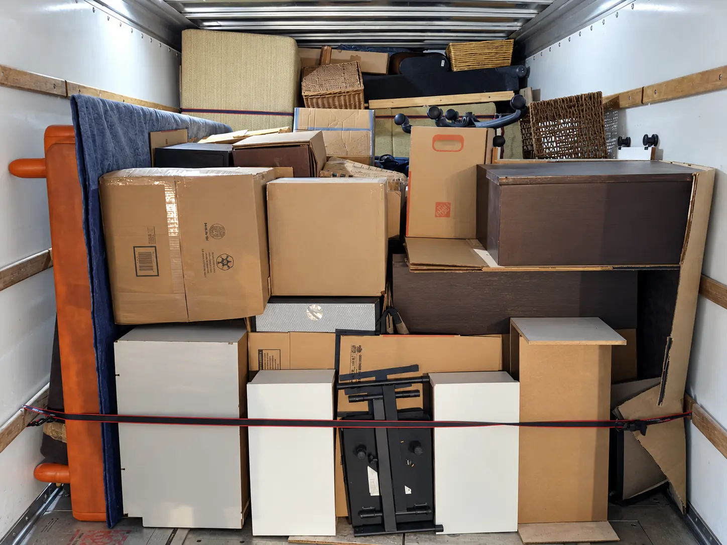 Moving truck efficiently loaded with furniture and boxes for an Easy Eight local move.